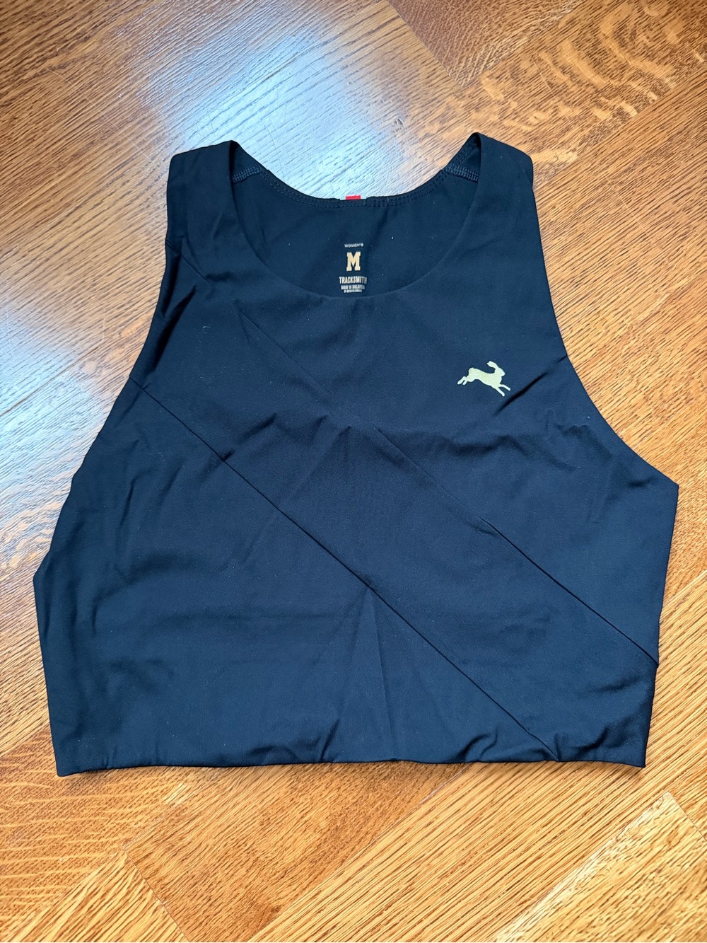 Tracksmith Black Cropped Athletic Tank with Gold Logo